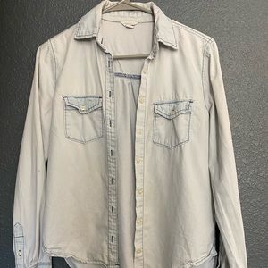 Light blue button up shirt. Size small